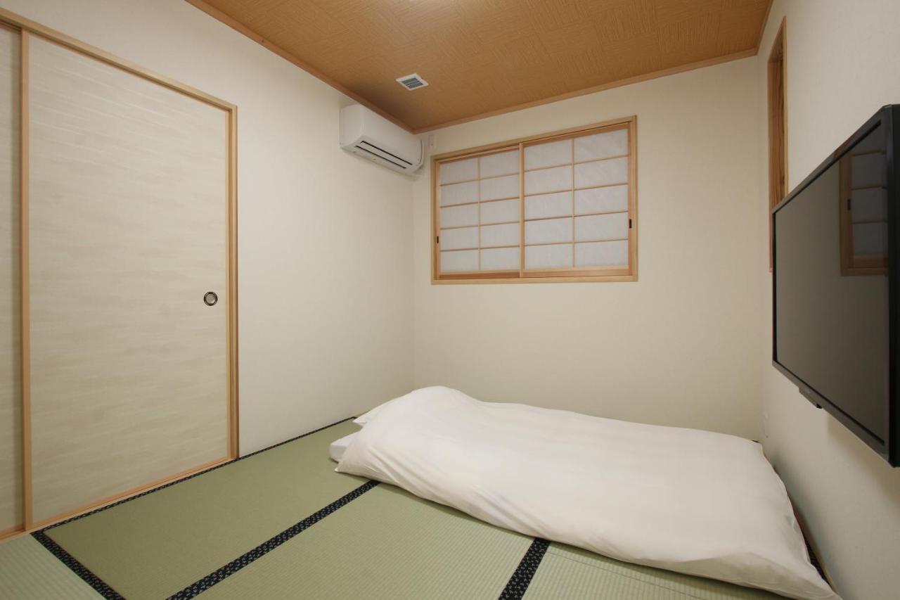 Отель Hitoyoshi Onsen Ohgano Yado Экстерьер фото